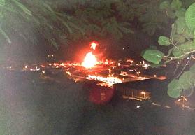 The explosion at Gasworks, seen from a nearby hillside. (Photo by Celia Carroll)