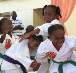 Young martial artists entertain with a demonstration of prowess and precision. Young martial artists entertain with a demonstration of prowess and precision.