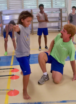 Coach Patrick Ramsdell helps Amada Ruparelia with her form. Coach Patrick Ramsdell helps Amada Ruparelia with her form.