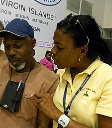 Celia Victor (right), leader of the project medical team, talks to a client. Celia Victor (right), leader of the project medical team, talks to a client.