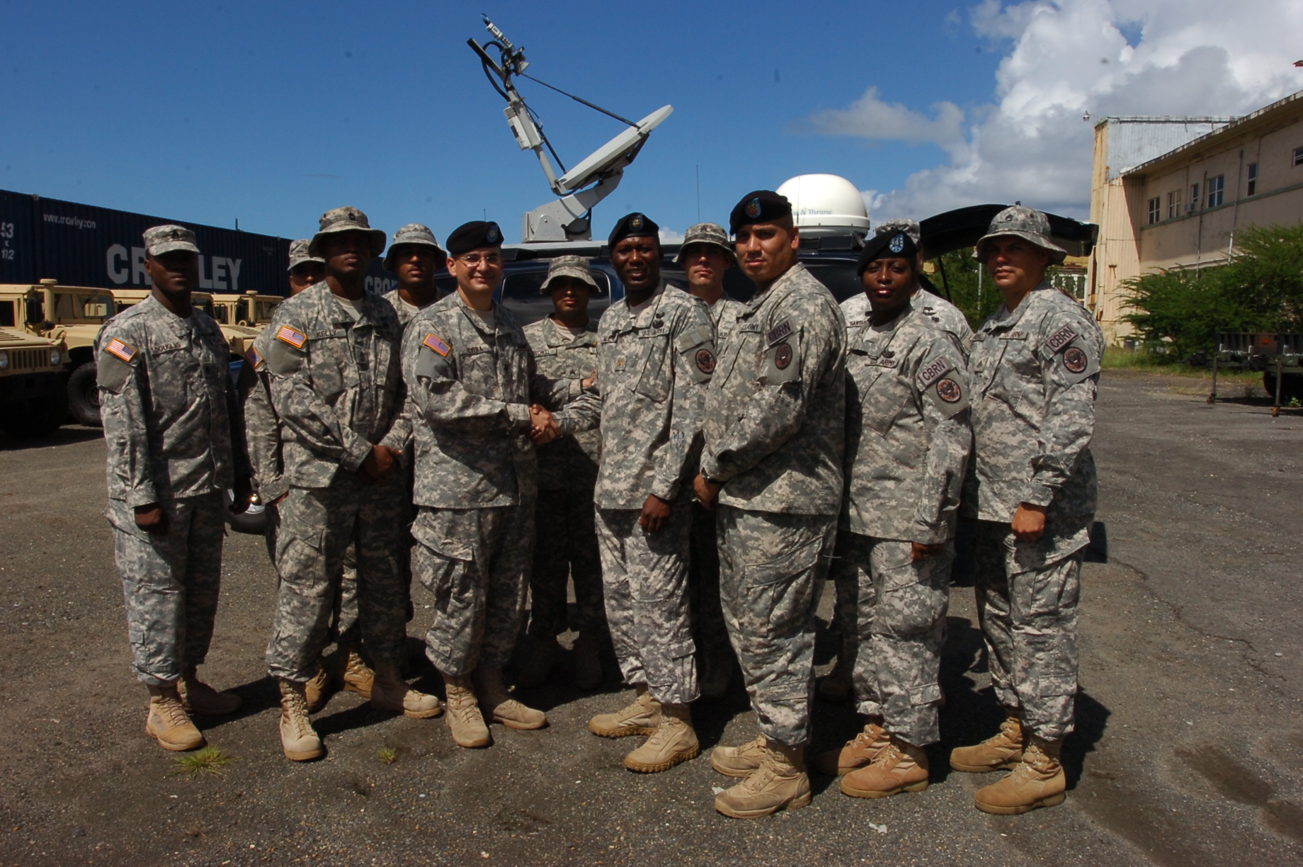  National Guard Lt. Col. Carlos Rivera (center) thanks V.I. National ...