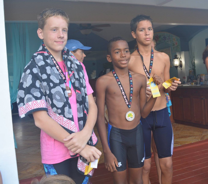 Winners of the 12-15 age category are Colton Fauquher (3rd), Brice Richards (2nd), Mikey Dizon-Bumann (1st)
