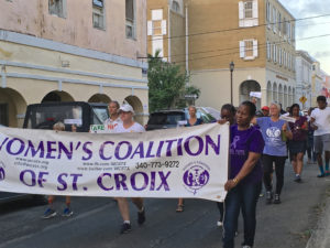 Women’s Coalition supporters march in memory of those who died due to domestic violence. (Marina Leonard photo)