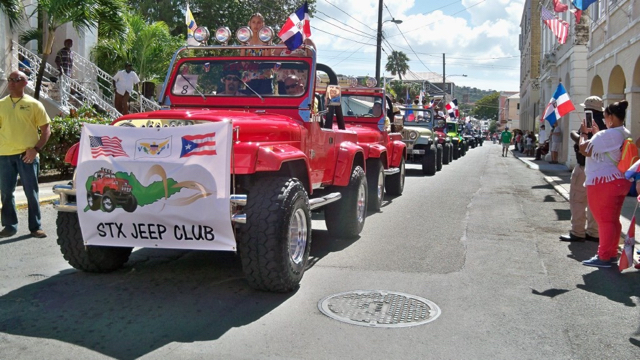 Jeeps parade through Christiansted as part of the Dominican culture parade.