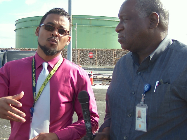 V.I. Port Authority representatives Damian Cartwright, left, and David Mapp discuss upcoming projects. 