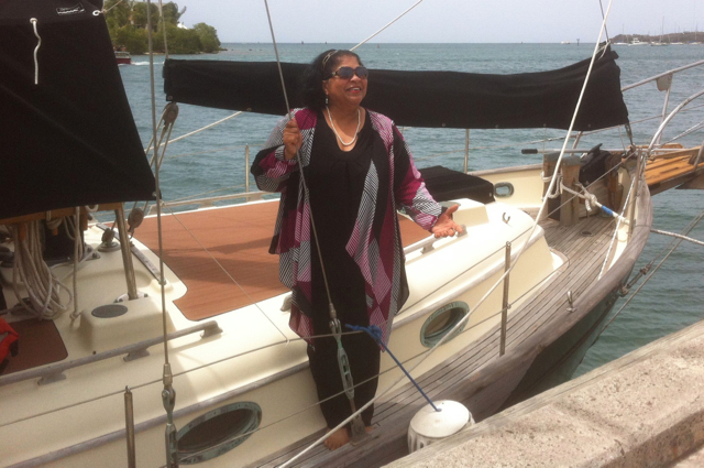 Evelyn Henville, executive director of Nevis Historical and Conservation Society, arrives Sunday at Christiansted harbor.