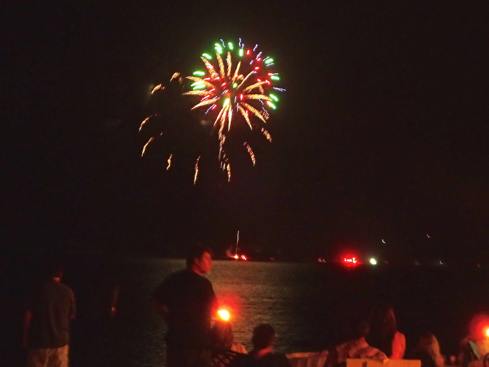 Fireworks light up the night sky and reflect off the Caribbean Saturday as St. Croix celebrates the Fourth of July.