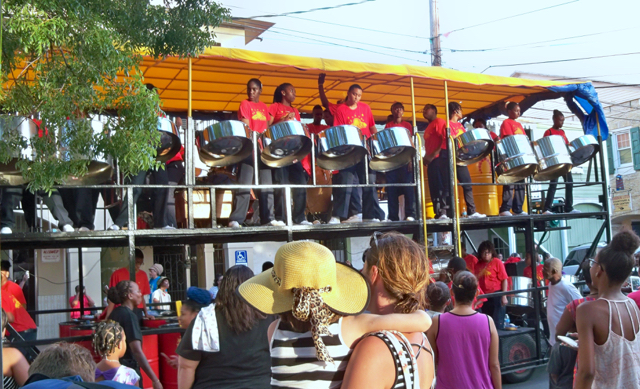 Rising Stars escort Santa into Frederiksted.