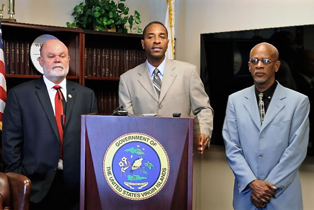 From left, Motor Vehicles Director Lawrence Olive, Attorney General Claude Walker and DLCA Commissioner Devin Carrington announce the Toyota Repair-a-thon.