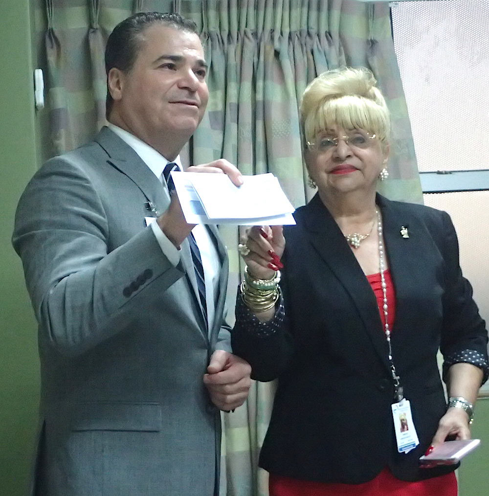 JFL board member Philip Arcidi presents a donation to board president Aracelis Bermudez Walcott, at Wednesday&rsquo;s board meeting. The donation brought the total gift amount on behalf of his family and Greenleaf VI over the last several years to $525,000.