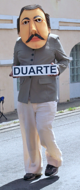 A parade participanrt represents Juan Pablo Duarte, one of the founding fathers of the Dominican Republic.