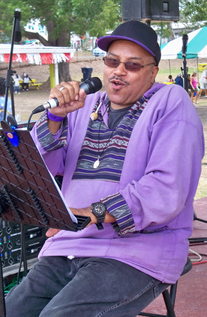 Peter Clements sings for the crowd on Monday.