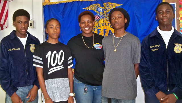 Arthur A. Richards FFA adviser Velda Hendricks, center, with club members Dale Williams II, left, Deshawnte Charlery, Jahmarie Gordon, and Michael George.