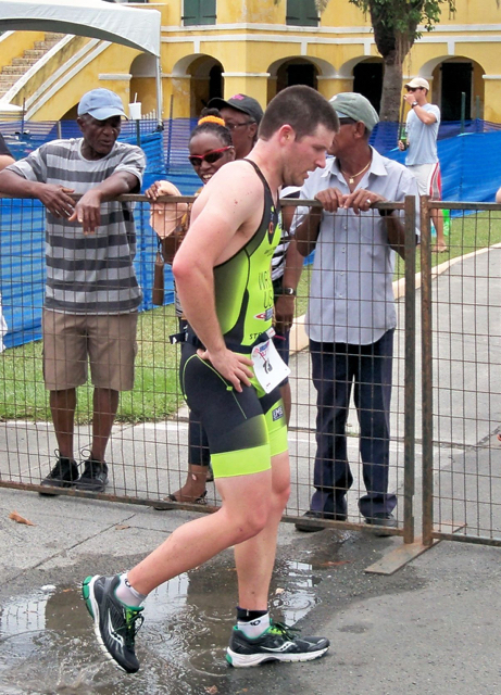Stephen Wright catches his breath after finishing the grueling race in second place Sunday.