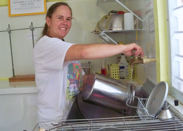 Bethany Bradford works in the cheese room at her Fiddlewood Farm.