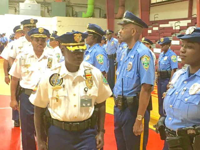 St. Croix police officers are inspected by department officials Monday's inspection at St. Croix Central High School Gymnasium. (Photo provided by the V.I. Police Department)