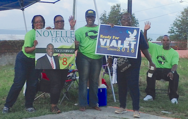Democrats support their candidates near Juanita Gardine Elementary School during Saturday&rsquo;s primary.