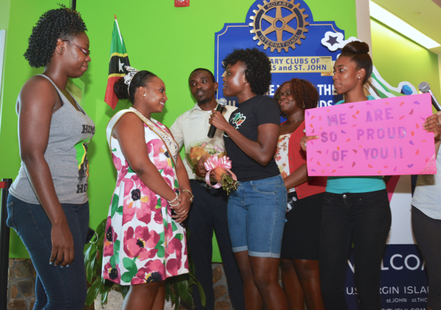 Che-Raina Warner, second from left, is welcimed home Monday after her win at the Miss National Black College Alumni Association Hall of Fame Saturday. (Photo provided by UVI)