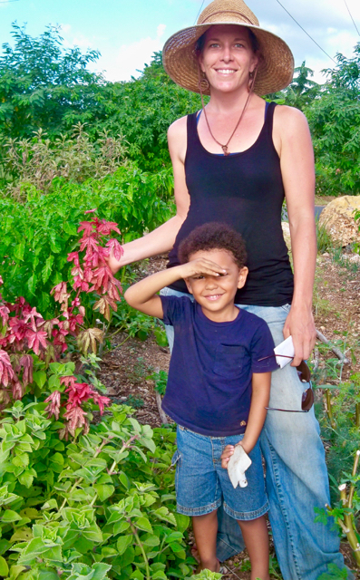 Jessica Ewer and her son, Damian Philip, in the garden.