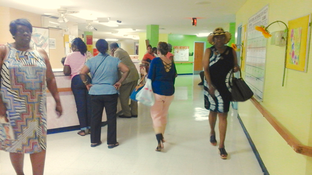 Adult caregivers and relatives of Sea View nursing home residents head to the facility's day room Saturday for a meeting with Gov. Kenneth Mapp. (Judi Shimel photo)