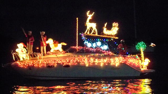 Brightly decorated boats were the star of the show in Christiansted harbor Saturday night. (Carol Buchanan photo)