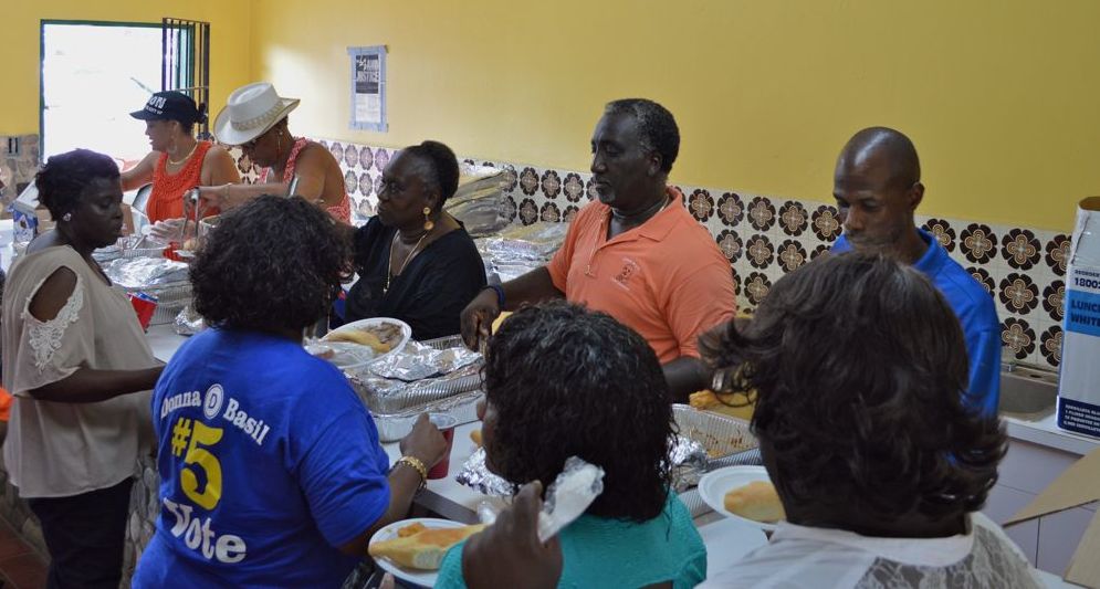 Volunteers serve up hundreds of pounds of donated beef and bread during the 2014 Liberty Day ceremonies honoring journalist and labor organizer D. Hamilton Jackson. (Bill Kossler photo)