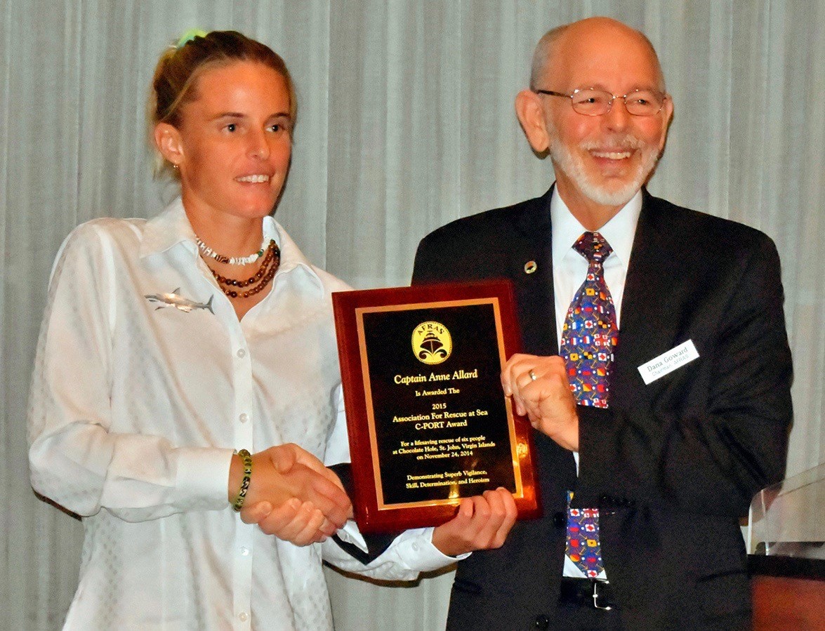 Captain Anne Allard receives Life Saving Award from Dana Goward USCG