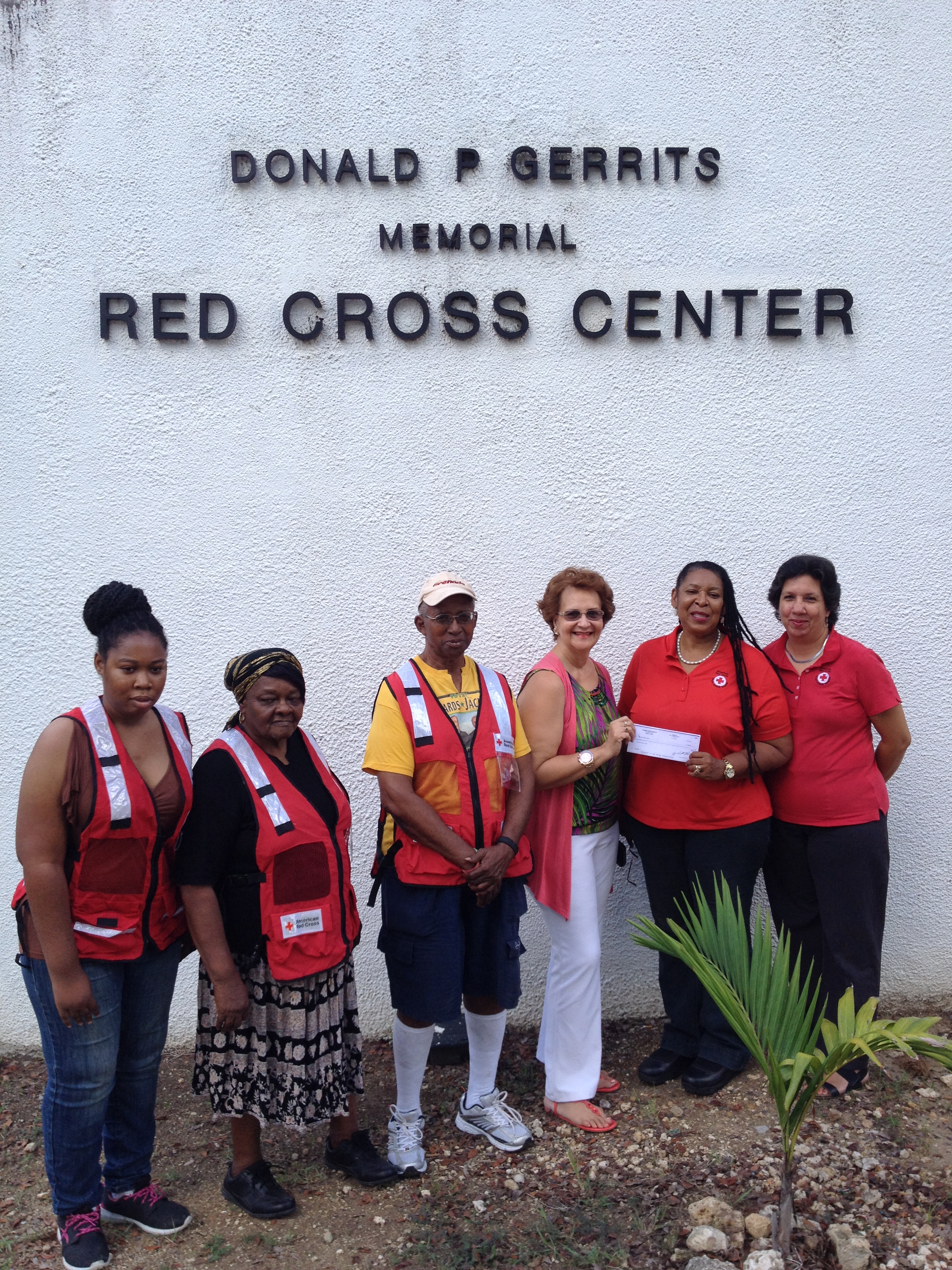 Caribbean Reservations Inc. donates check to American Red Cross V.I. staff