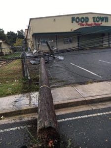 A utility pole lies in teh Food Town parking lot after being knocked over by Hurricane Irma. (Marina Ricci photo)