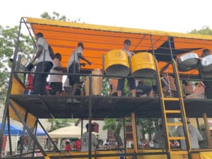 Steel pan orchestras got the music going with festive tunes.