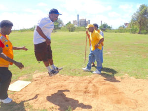 Leon Vanbeverhoudt gets some air in the long jump at the St. Croix Special Olympics.