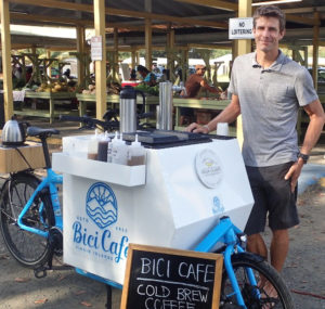 Stephen Swanton sells cold brewed coffee from his tricked-out bicycle at the La Reine Farmers Market Tuesdays-Thursdays.