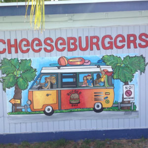  The Cheeseburgers in America's Paradise sign is next to the place in the restaurant where the table tennis table is located. (Photo from Cheeseburgers in Paradise's social media website)