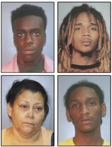 Police booking photos of the suspects whose arrests were announced Friday, clockwise from upper left, Link Baltimore, Youan Rodquez, Carl Cornelius and Bethzaida Verrios. (Photos provided by the VIPD)