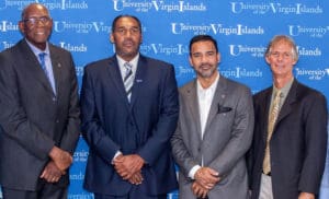 From left, UVI President David Hall, new men’s basketball coach Jeff Jones, UVI Athletic Director Wilberto Ramos and UVI soccer coach Charles Long. (Photo © Aisha-Zakiya Boyd)