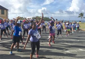 Runners warm up before the race. (Photo by Marina Ricci)