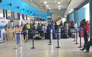 Passengers crowd into the Cyril E. King Airport Thursday to get the first fights out. (V.I. Port Authority photo)