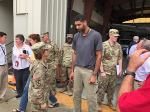 NBA star Tim Duncan meets with members of the National Guard.