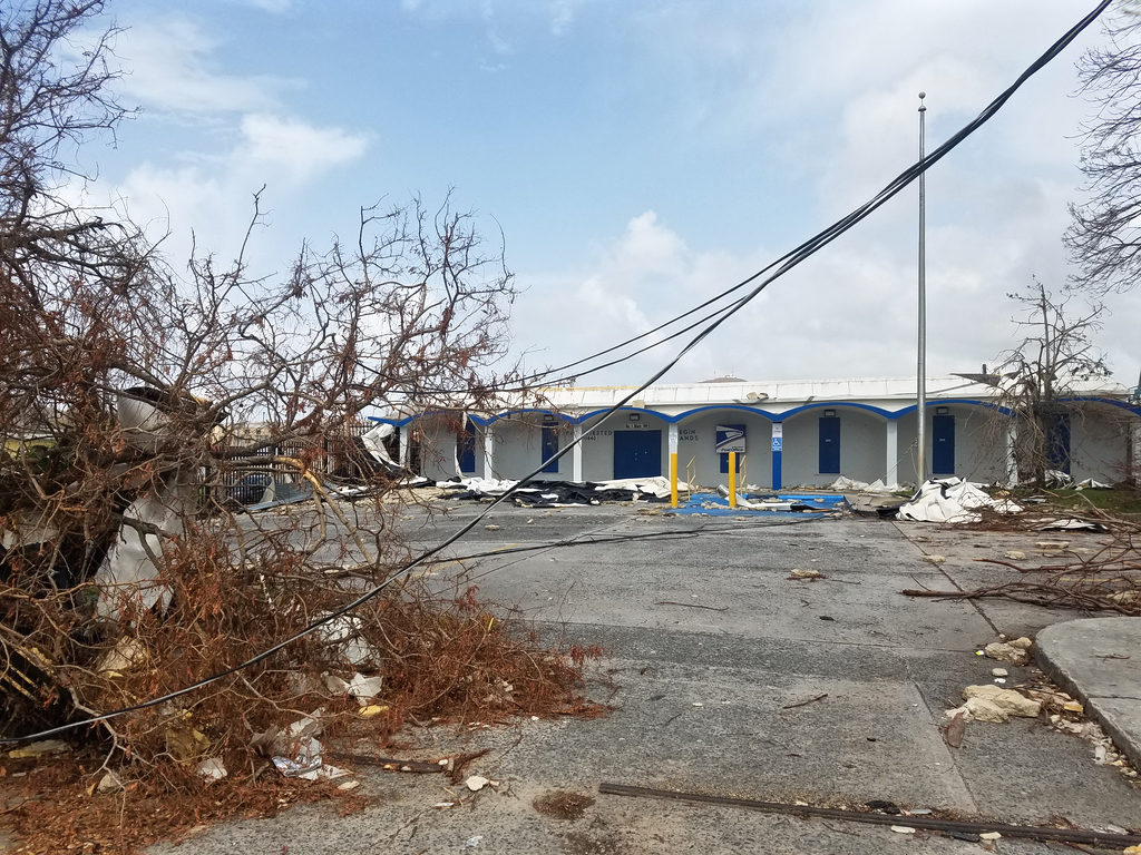 Debris still clutters the front of the Frederiksted Post Office. (Jamie Leonard photo)