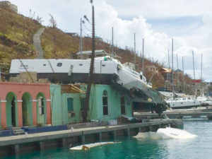 Hurricane Irma's force threw this catamaran on top of a dockside building. (Love City Strong)