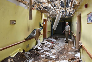 A DEMA team member assesses the damage at the Sea View Nursing Home in St. Thomas. (FEMA Photos by Jocelyn Augustino)