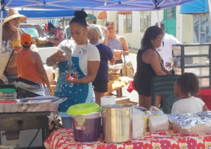 Vendors serve up food. (Jamie Leonard photo)