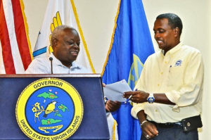 Gov. Kenneth Mapp announces the appointment of Clifford Graham, right, as chairman of the V.I. Hurricane and Resiliency Advisory Group during a news conference  Monday. (Photo provided by Government House)
