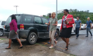 U.S. Secretary of Education Betsy deVos, center, visits Charlotte Amalie High School as part of her visit to observe hurricane damage to the territory's schools.