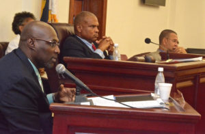 Sen. Novelle Francis, left, questions Angelo Riddick during Friday's committee hearing.