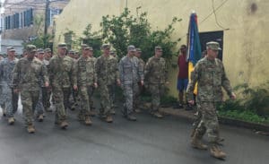 Guardsmen take part in Saturday's Veterans' Day parade.