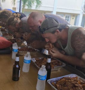 Contestants race to finish two pounds of bacon. (Photo by David Schnur)