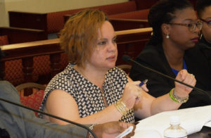 Commissioner of Labor Catherine Hendry speaks at an information-gathering hearing Monday.