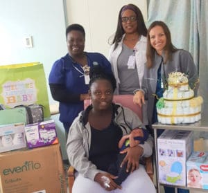 JFL’s Labor and Delivery nurse Colleen Liburd, Clinical Care Coordinator Antonya Williams, and nurse midwife Carol Roth pose with first St. Croix baby for 2018 and mom. (Photo by Juan F. Luis Hospital)