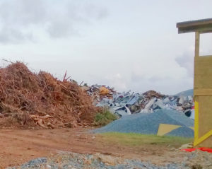 The territory's plan for post-storm debris management will help deal with mountains of material blown down by the two storms.